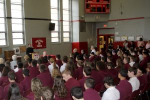 Fr. Allain Caparas addresses the Freshman, Sophmore and Junior classes of Saint Joseph High School.